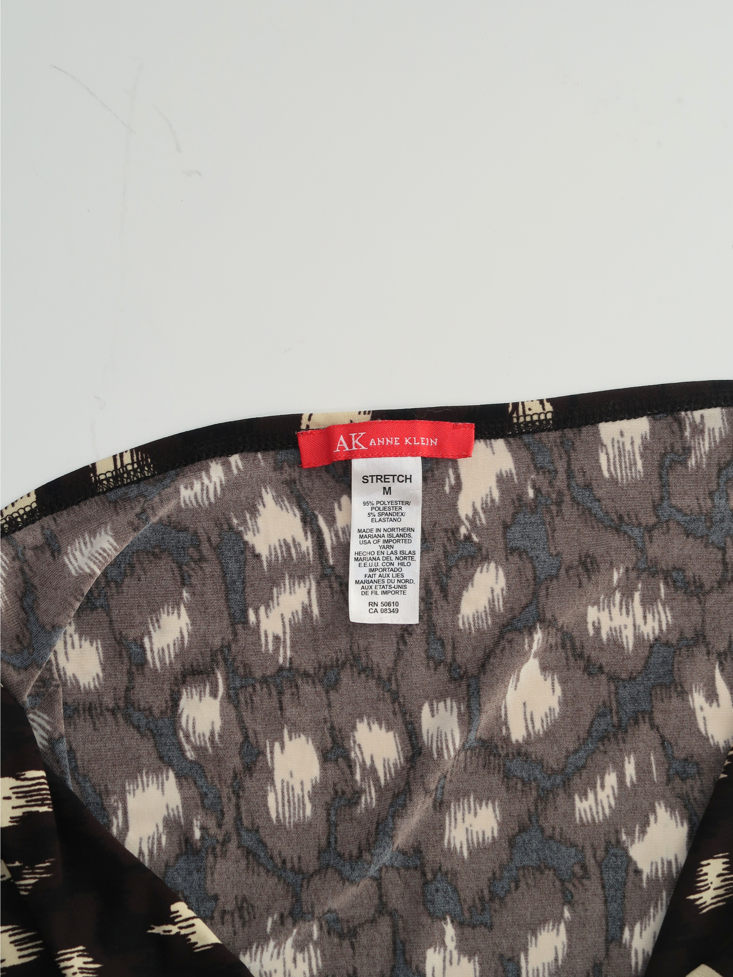 A035: “can’t be tamed” | plunged halter neck top