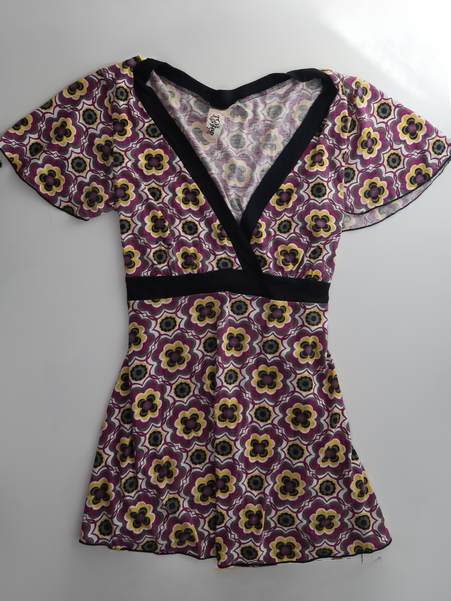 A013: “trippy bish” | plunge neck top with wrap tie waist
