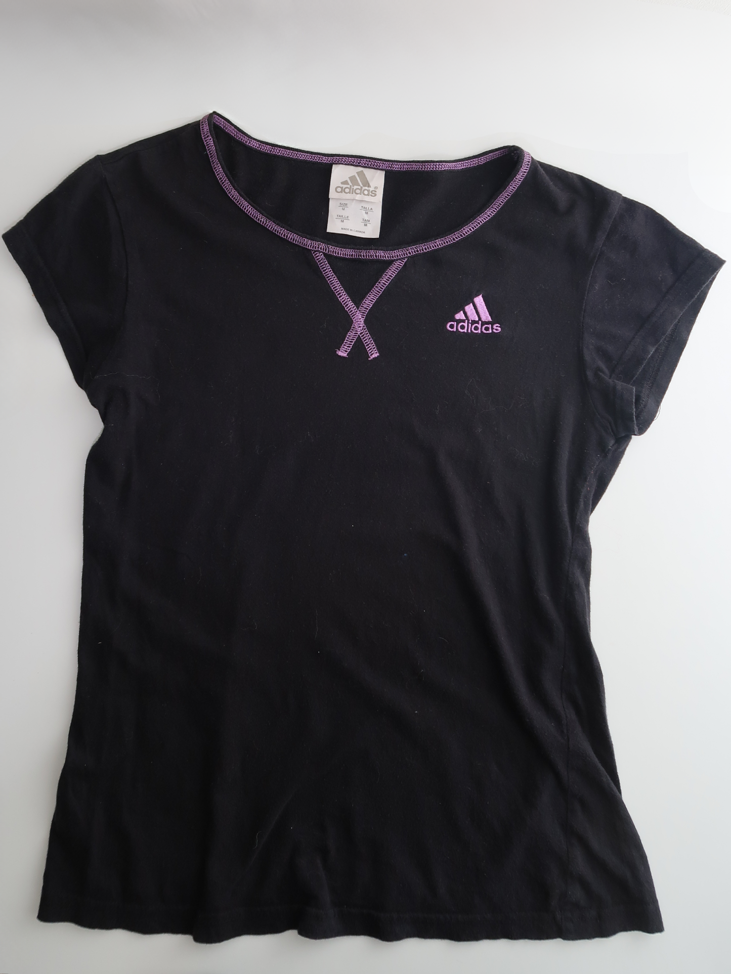 A018: “sporty spice” | adidas black tee with purple hem