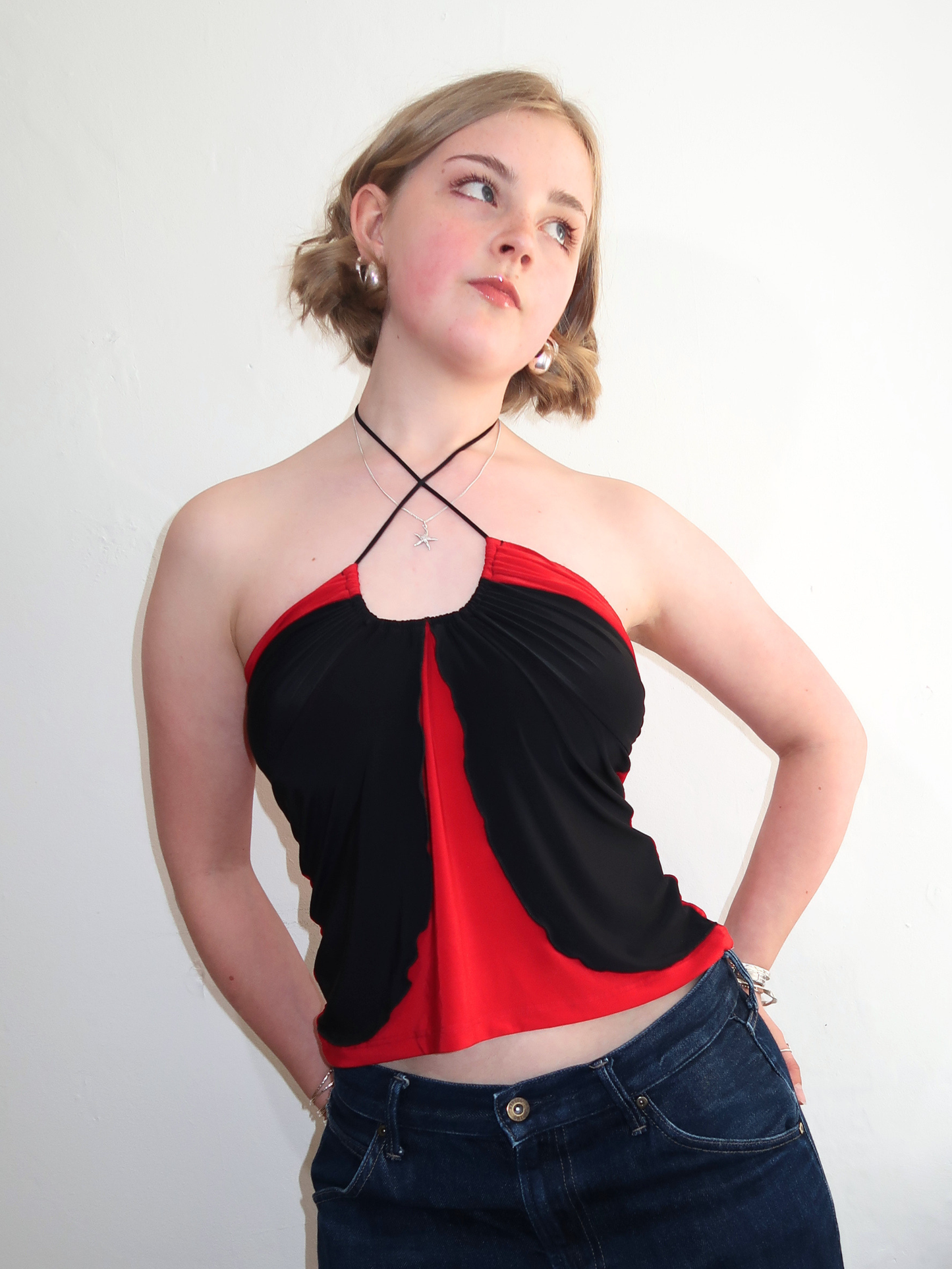 A060: “y2k xtina” | red and black spaghetti halter top