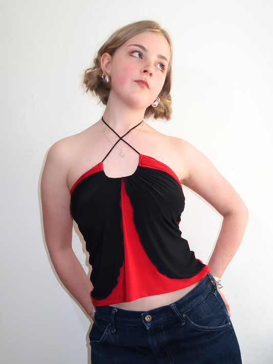 A060: “y2k xtina” | red and black spaghetti halter top