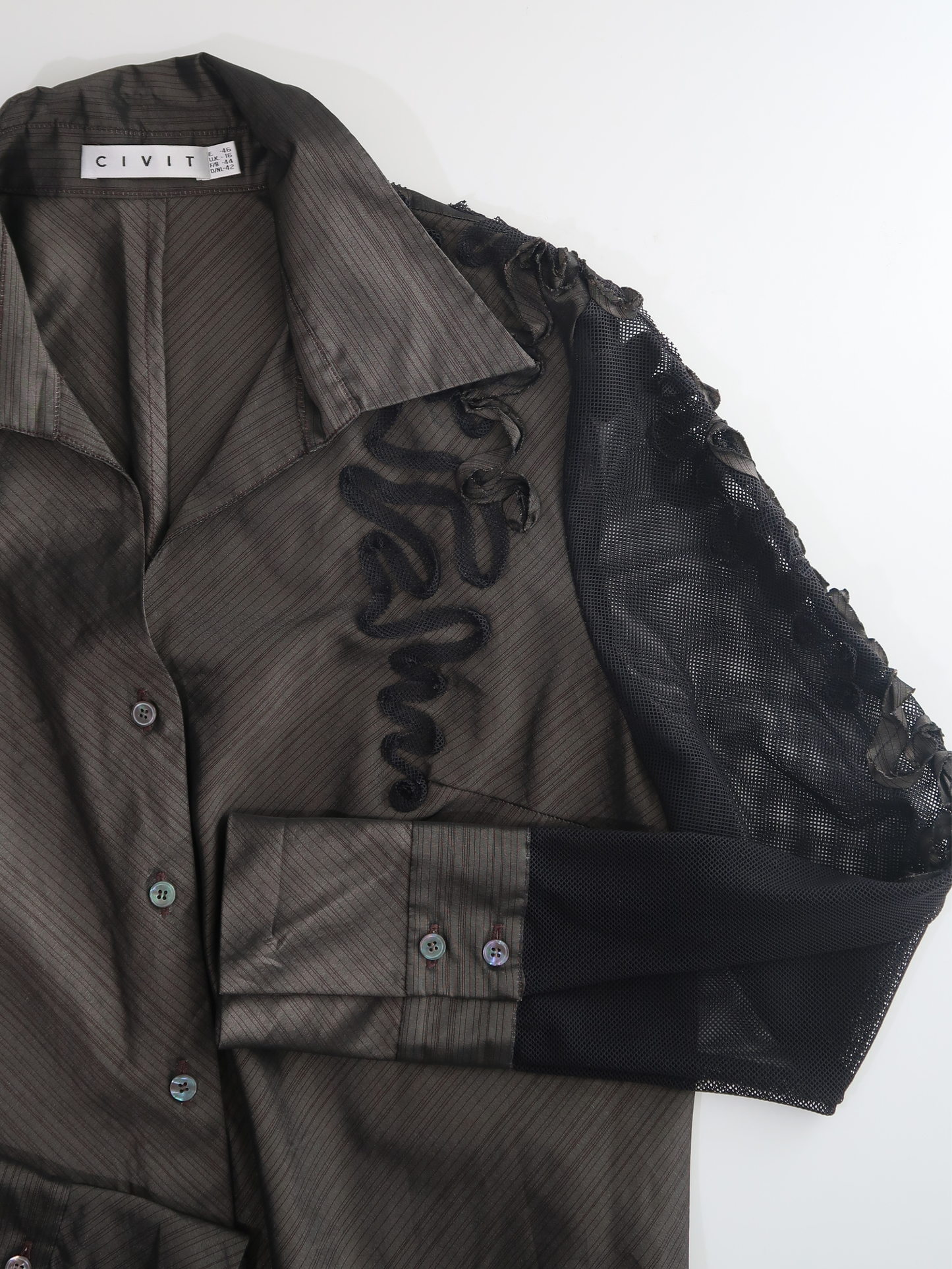 A036: “business on the body, party on the sleeves” | brown rosette collared shirt with mesh sleeves