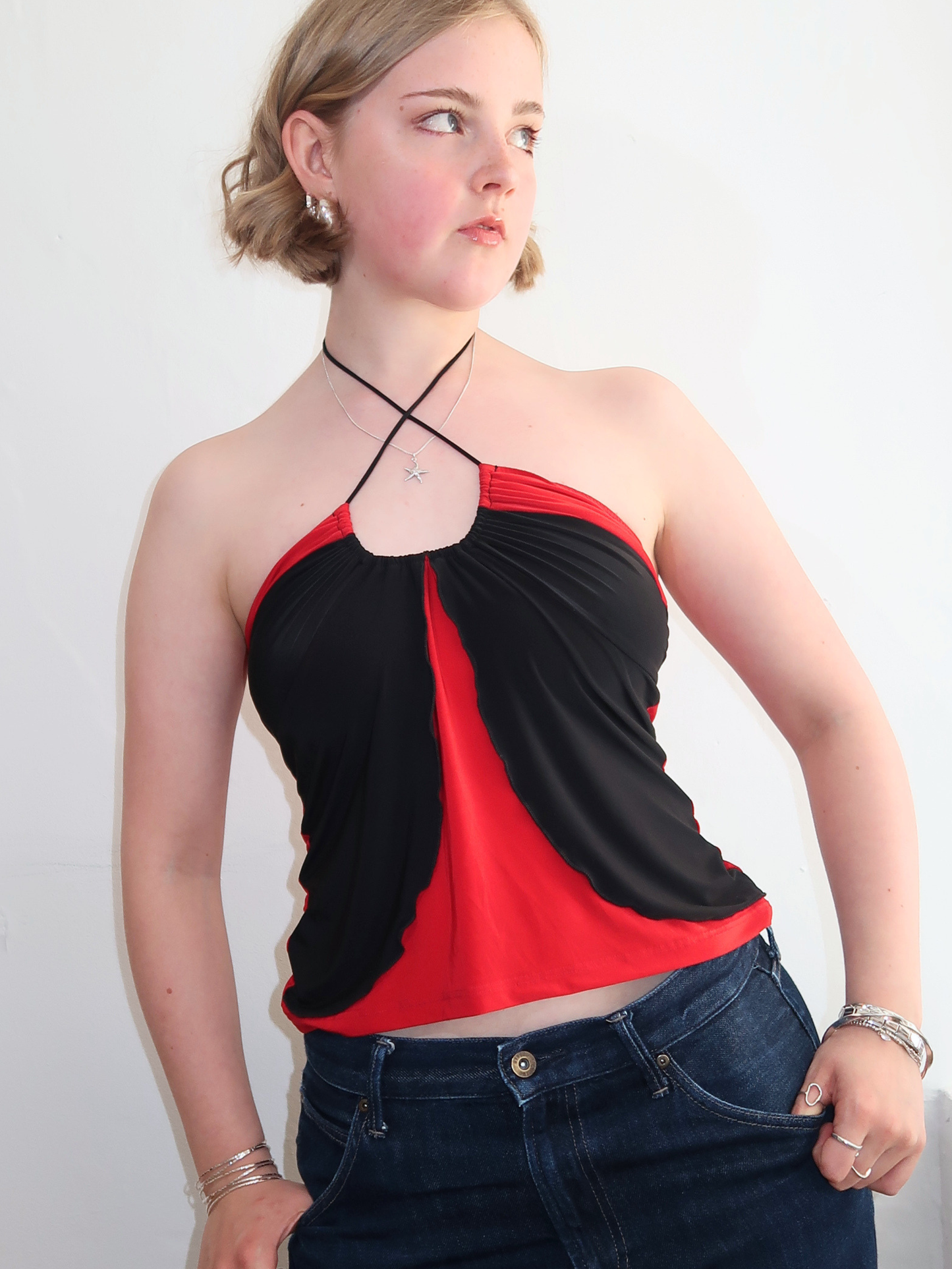 A060: “y2k xtina” | red and black spaghetti halter top