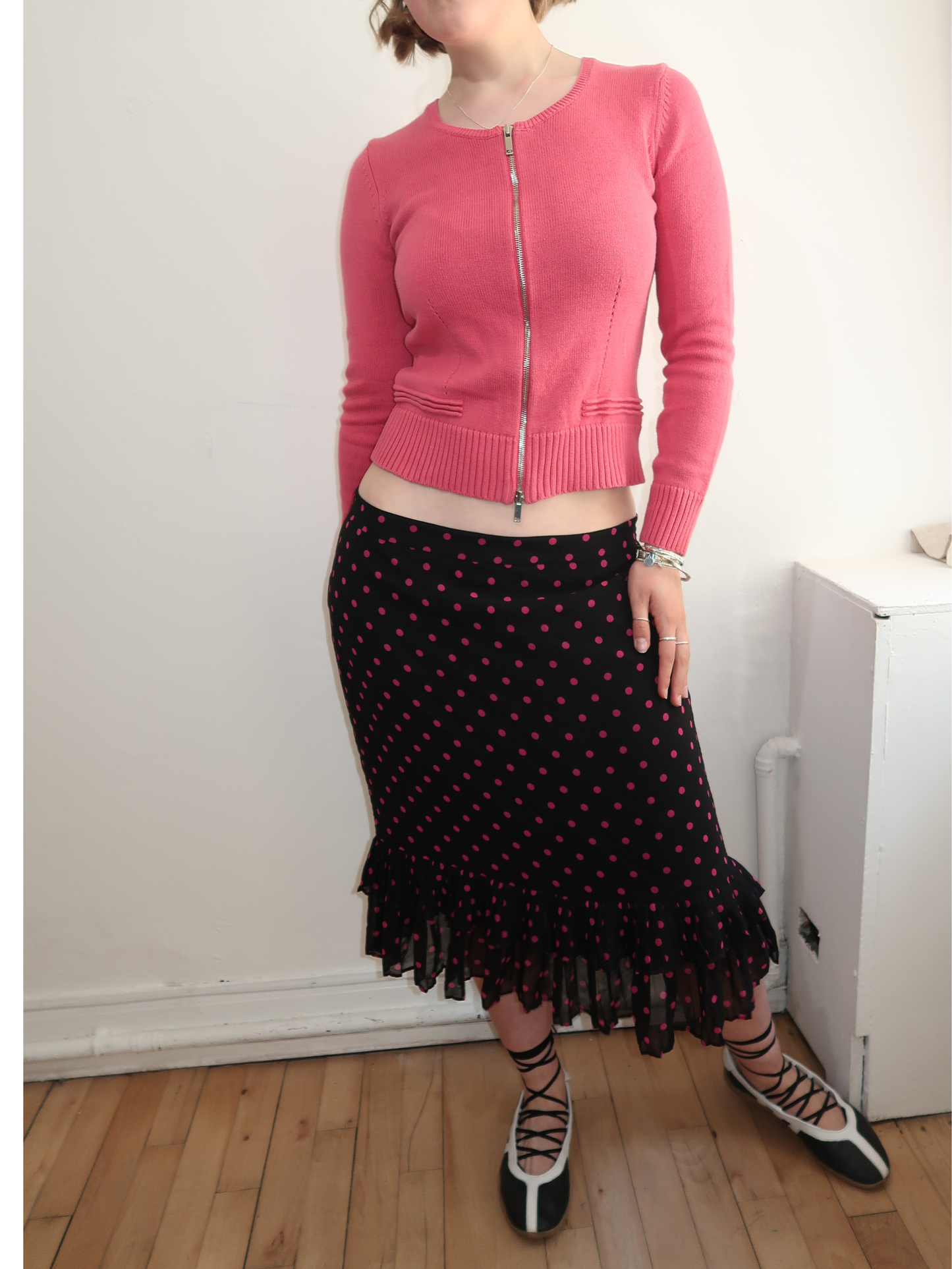 A055: “have you ever seen a pair of these bobby boucher..” | pink double zipped jumper