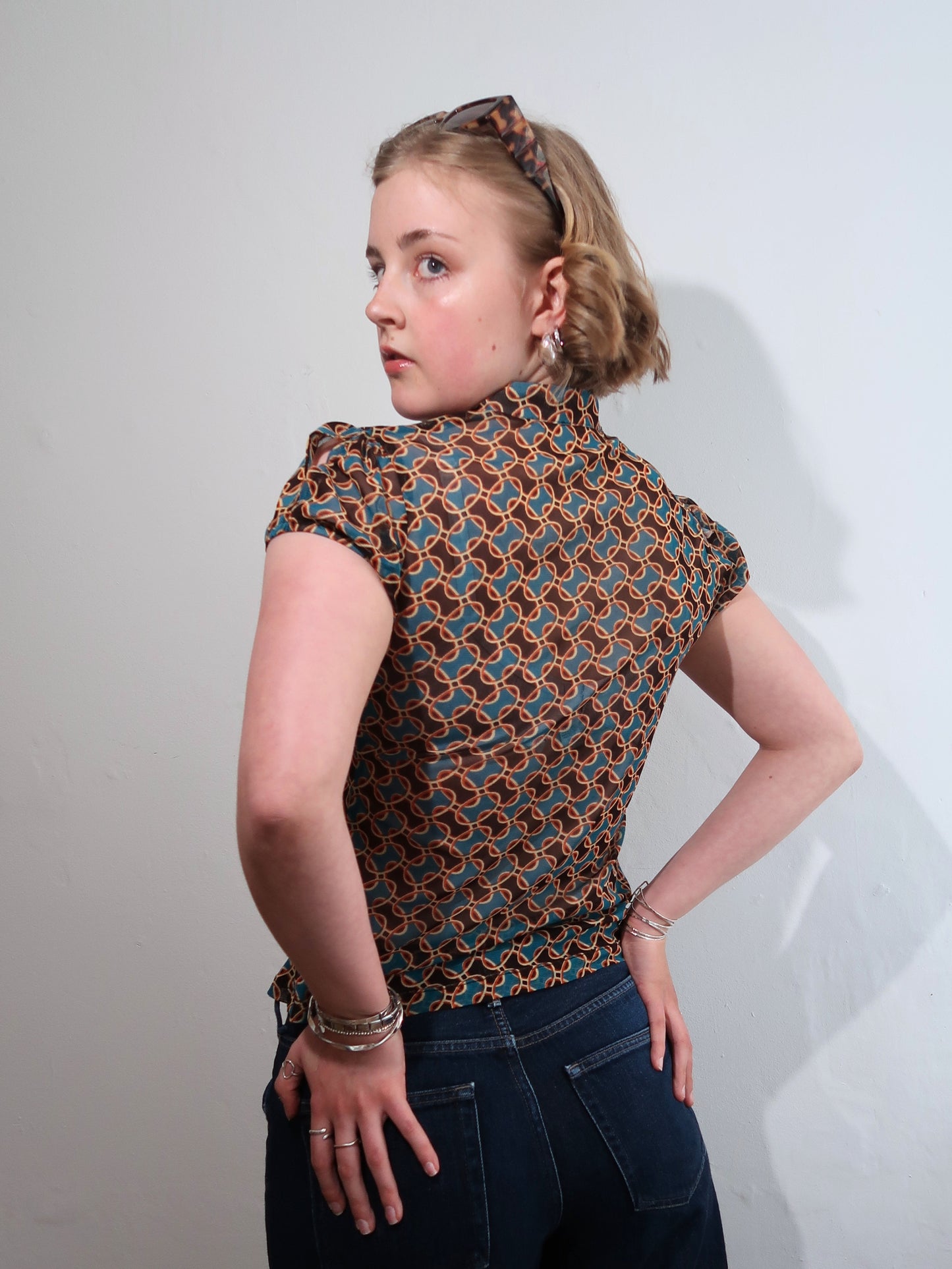 A063: “70s fever” | sheer blouse with v neck
