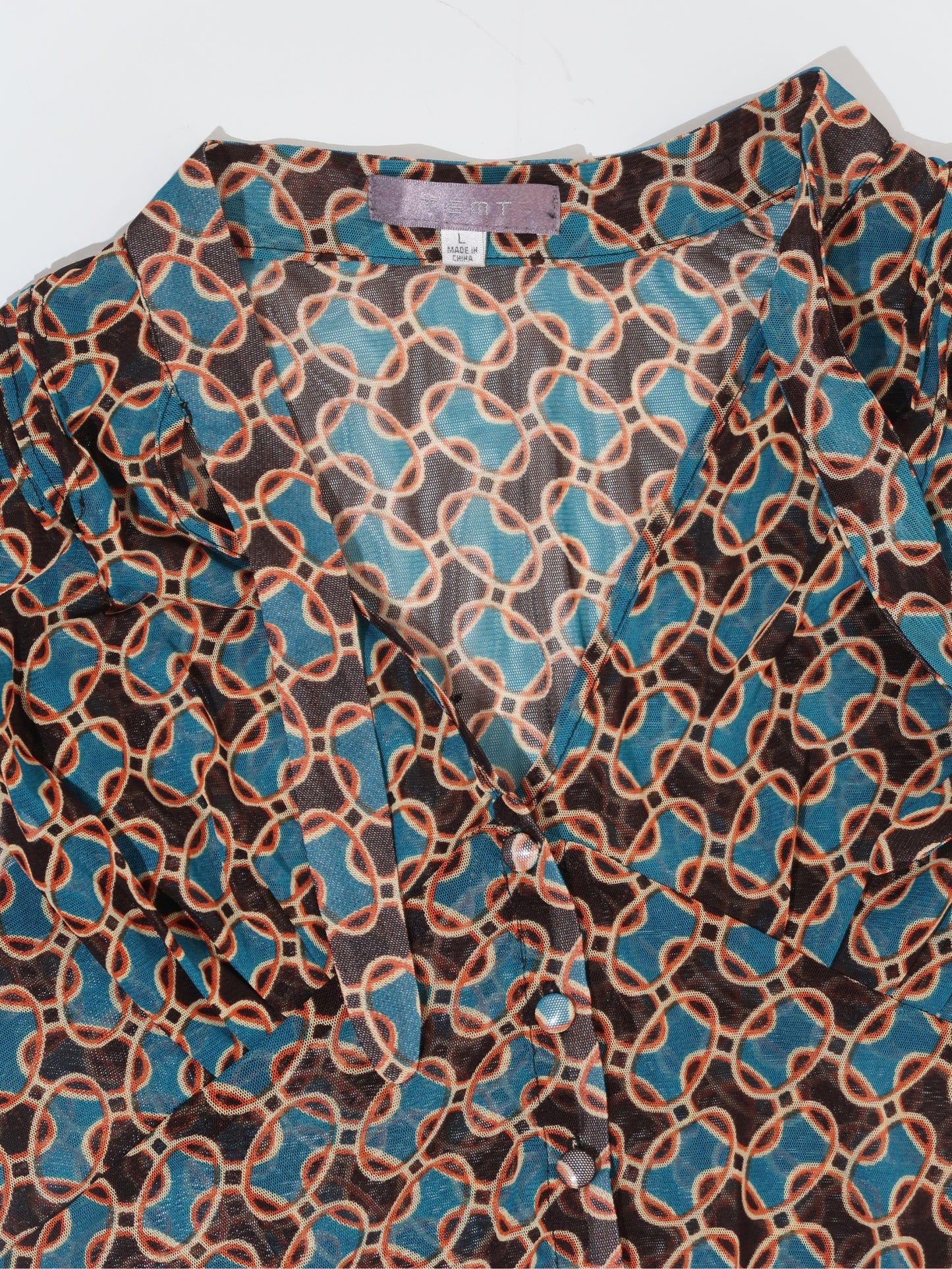A063: “70s fever” | sheer blouse with v neck