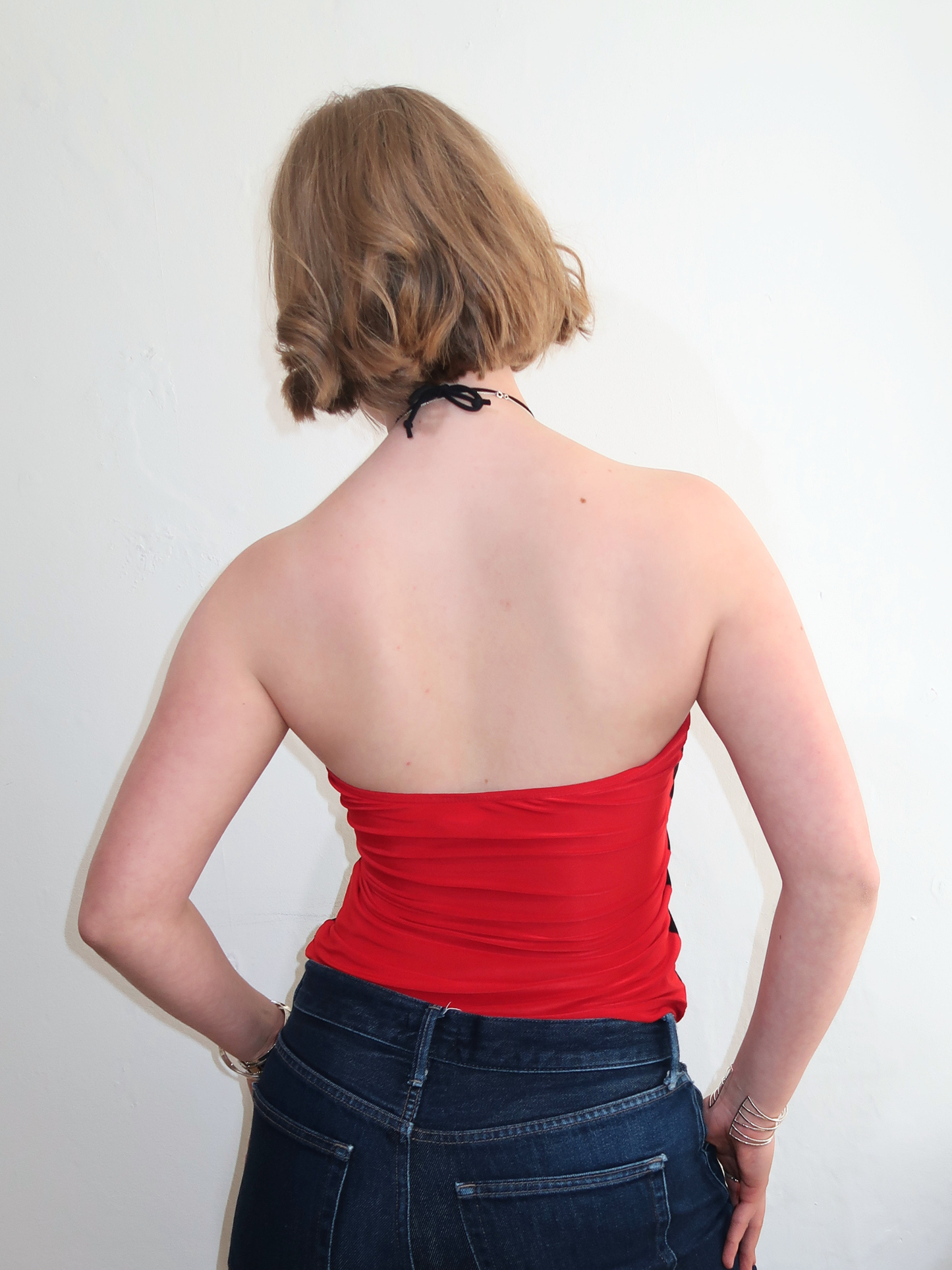 A060: “y2k xtina” | red and black spaghetti halter top