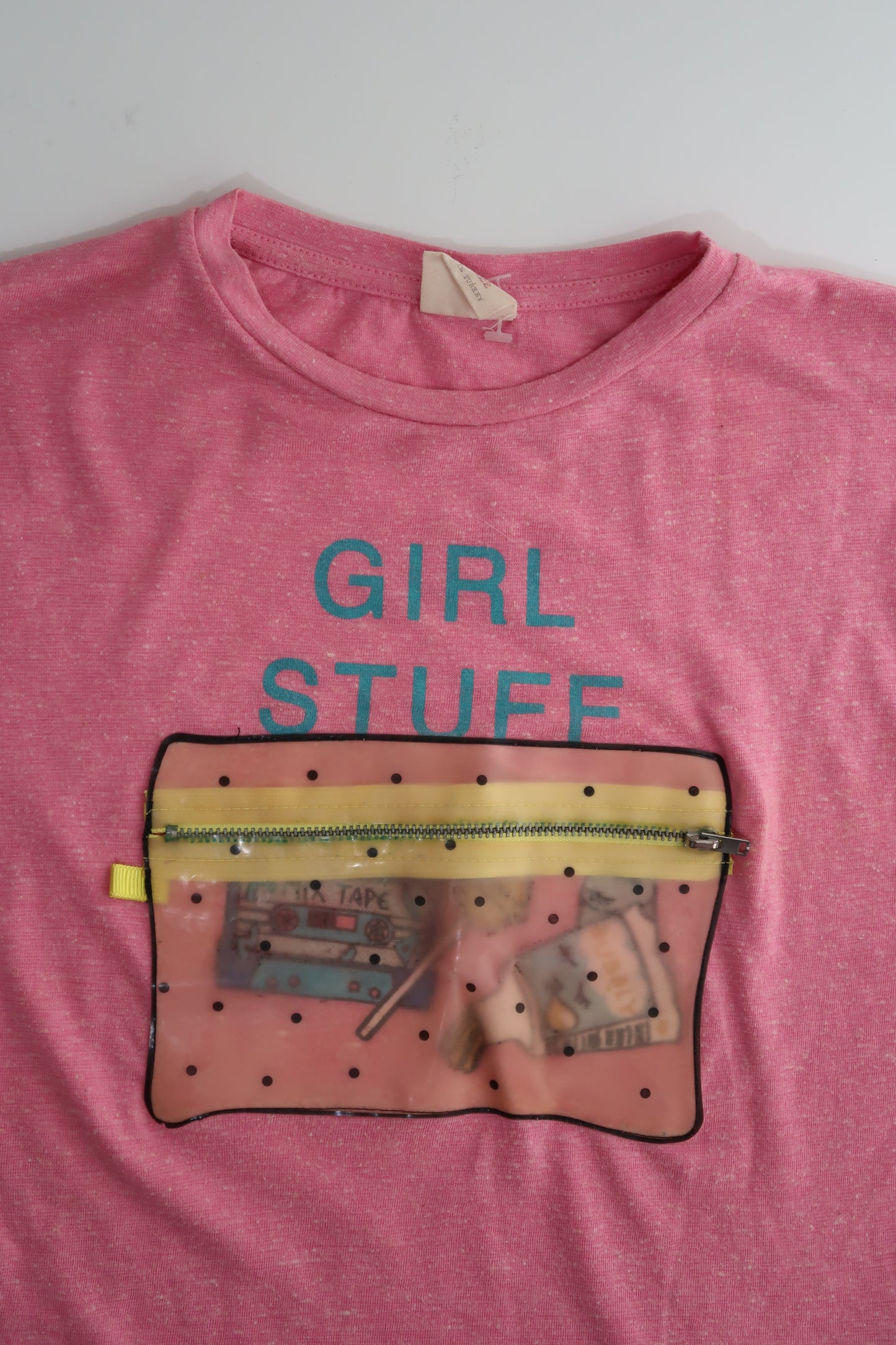 A010: “polly’s pocket” | THE baby pink baby tee