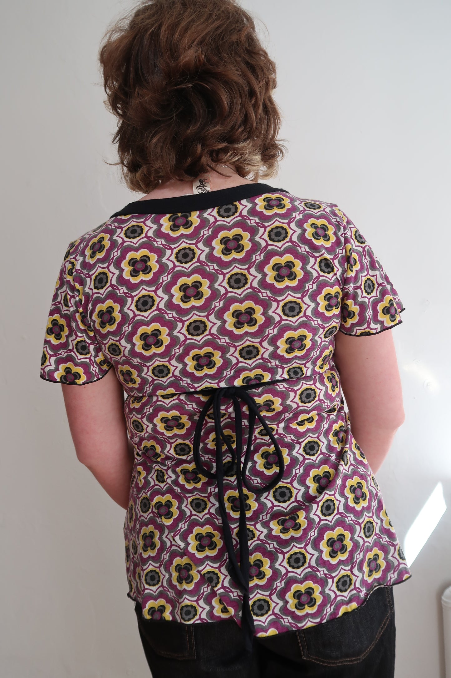 A013: “trippy bish” | plunge neck top with wrap tie waist
