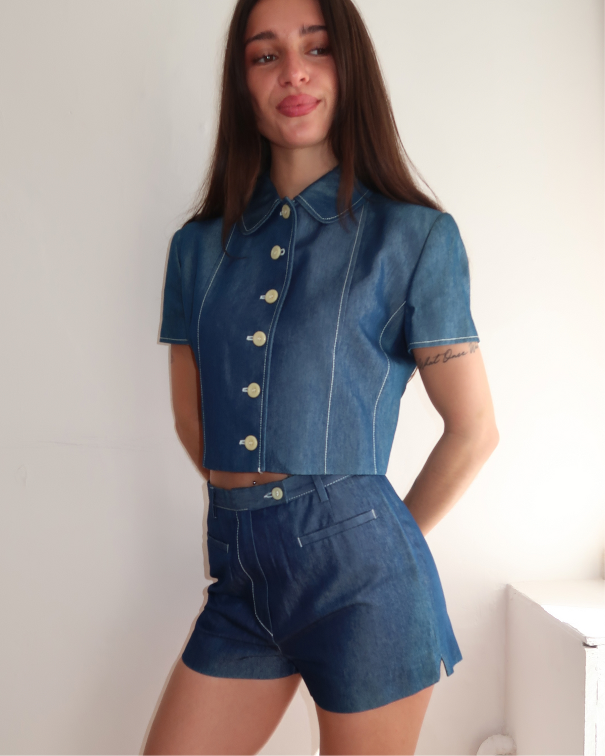model wears "Le François Set" vintage french 70s denim jacket & hot pants co-ord