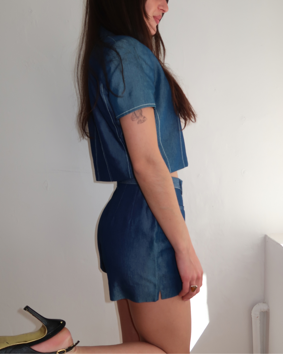 model wears "Le François Set" vintage french 70s denim jacket & hot pants co-ord