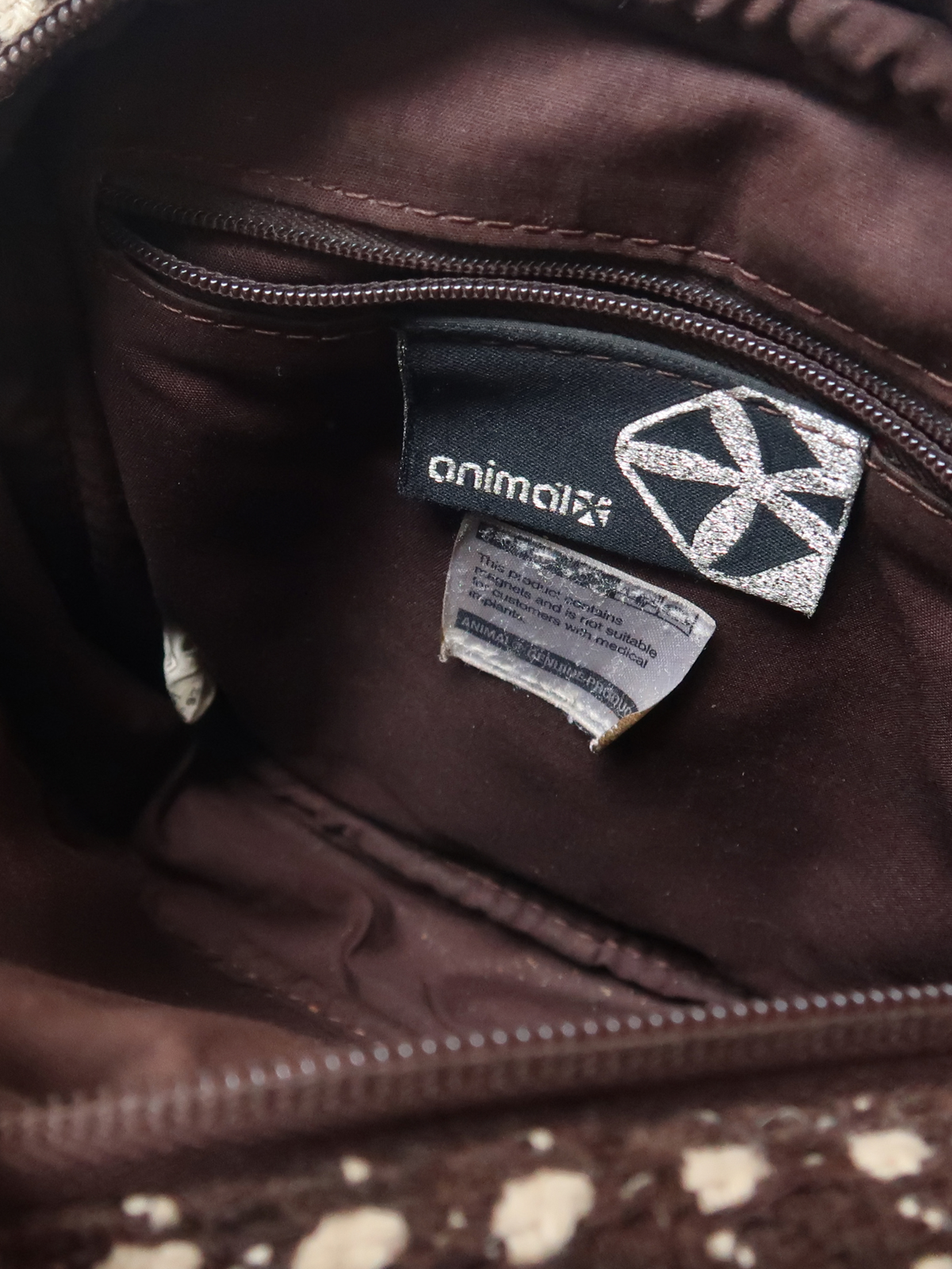 image of animal cross body bag with buckle front