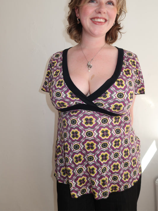 A013: “trippy bish” | plunge neck top with wrap tie waist