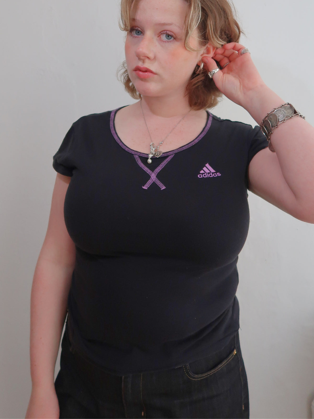 A018: “sabrina goes to PE” | adidas black tee with purple hem