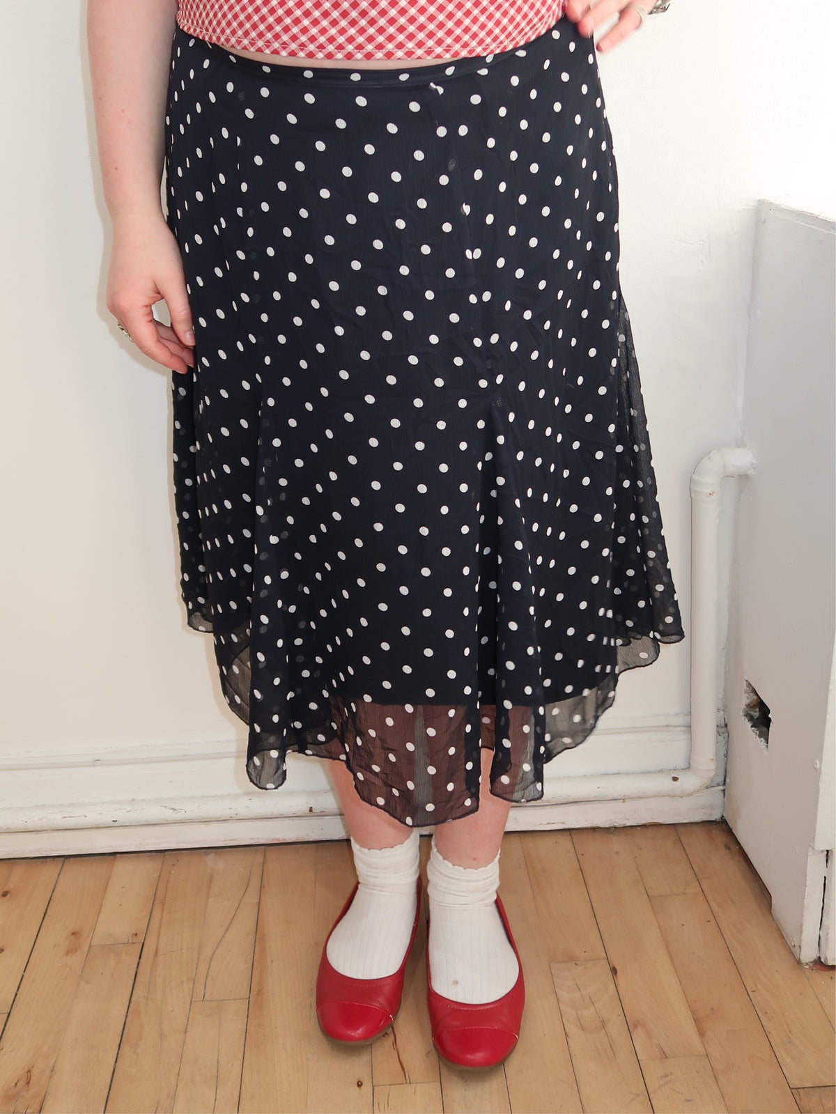 A068: “dot diva” | black polka dot midi skirt