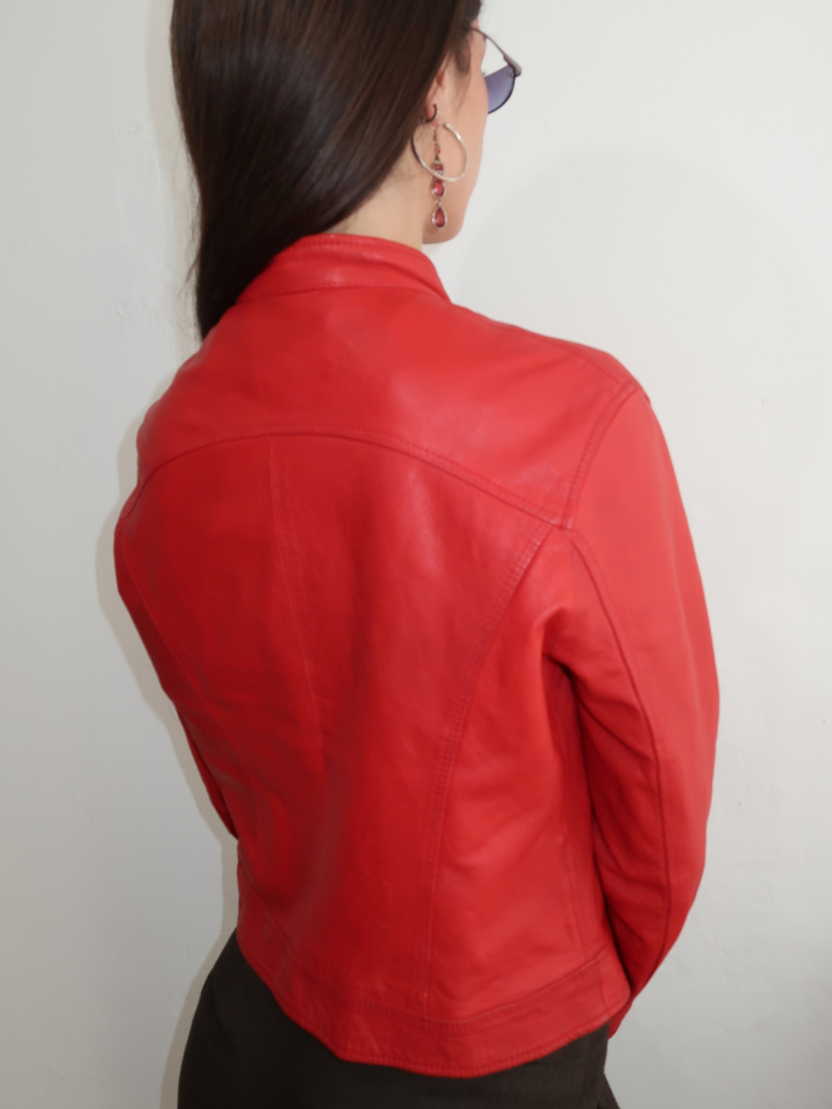 model wears tyler durden red leather jacket